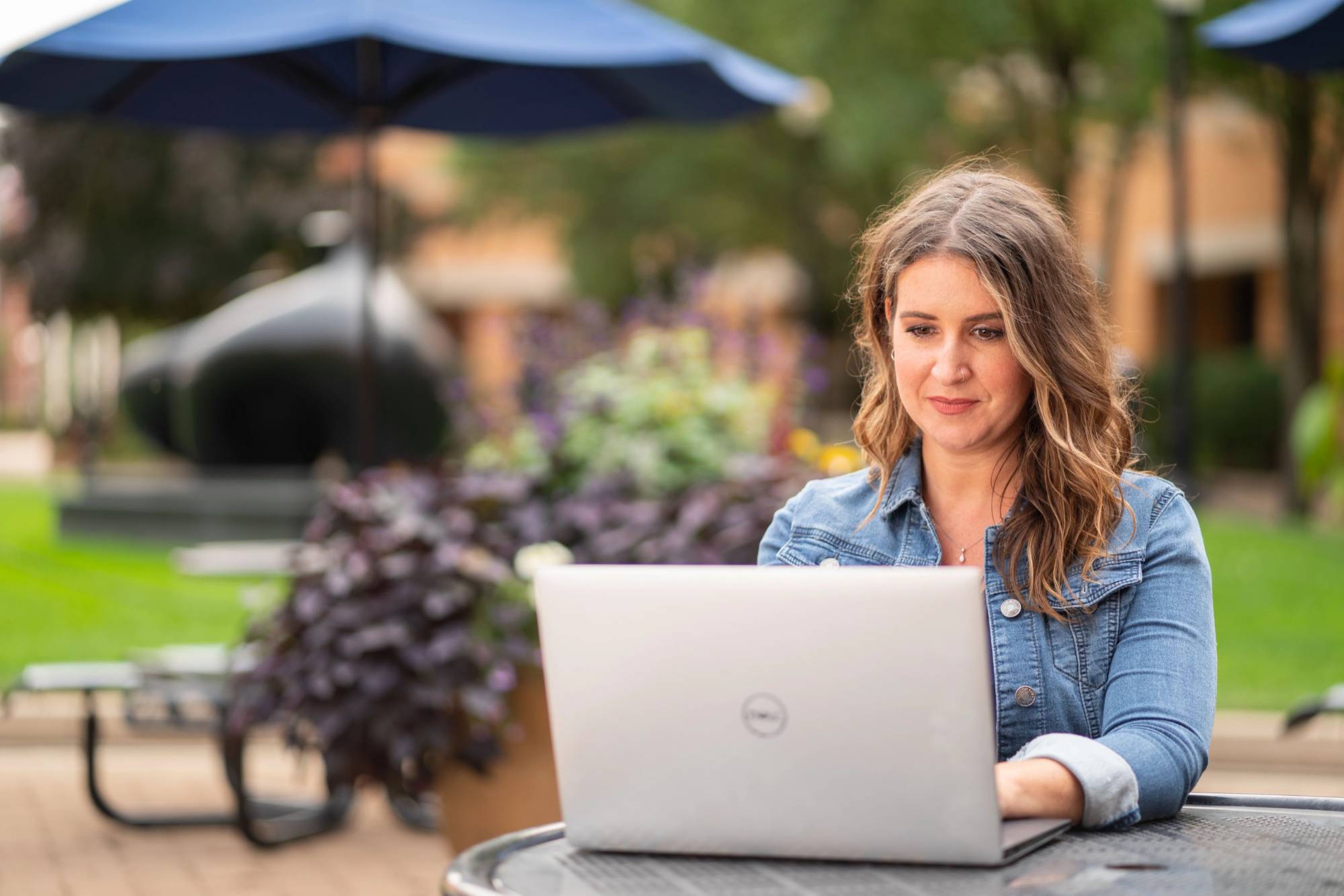 an adult student on Grand Valley's Robert C. Pew campus.